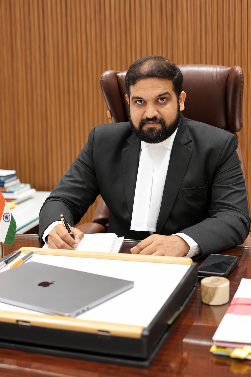 Animesh Tiwari, Advocate, seated at his desk in A.T. Law Chambers